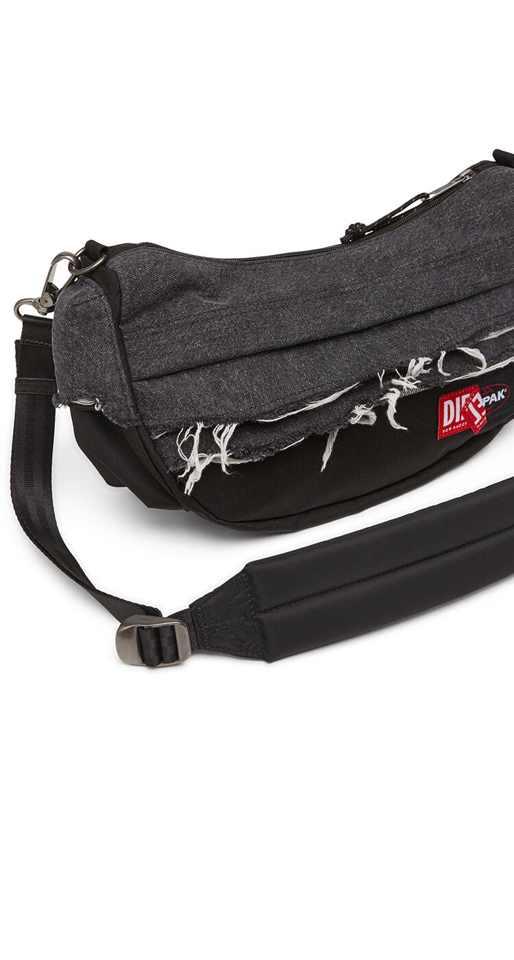 Shoulder bag in destroyed denim and CORDURA&reg;